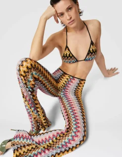 Ausgestellte Low-Waist Hose aus Lamé-Viskose-Spitze