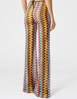 Ausgestellte Low-Waist Hose aus Lamé-Viskose-Spitze