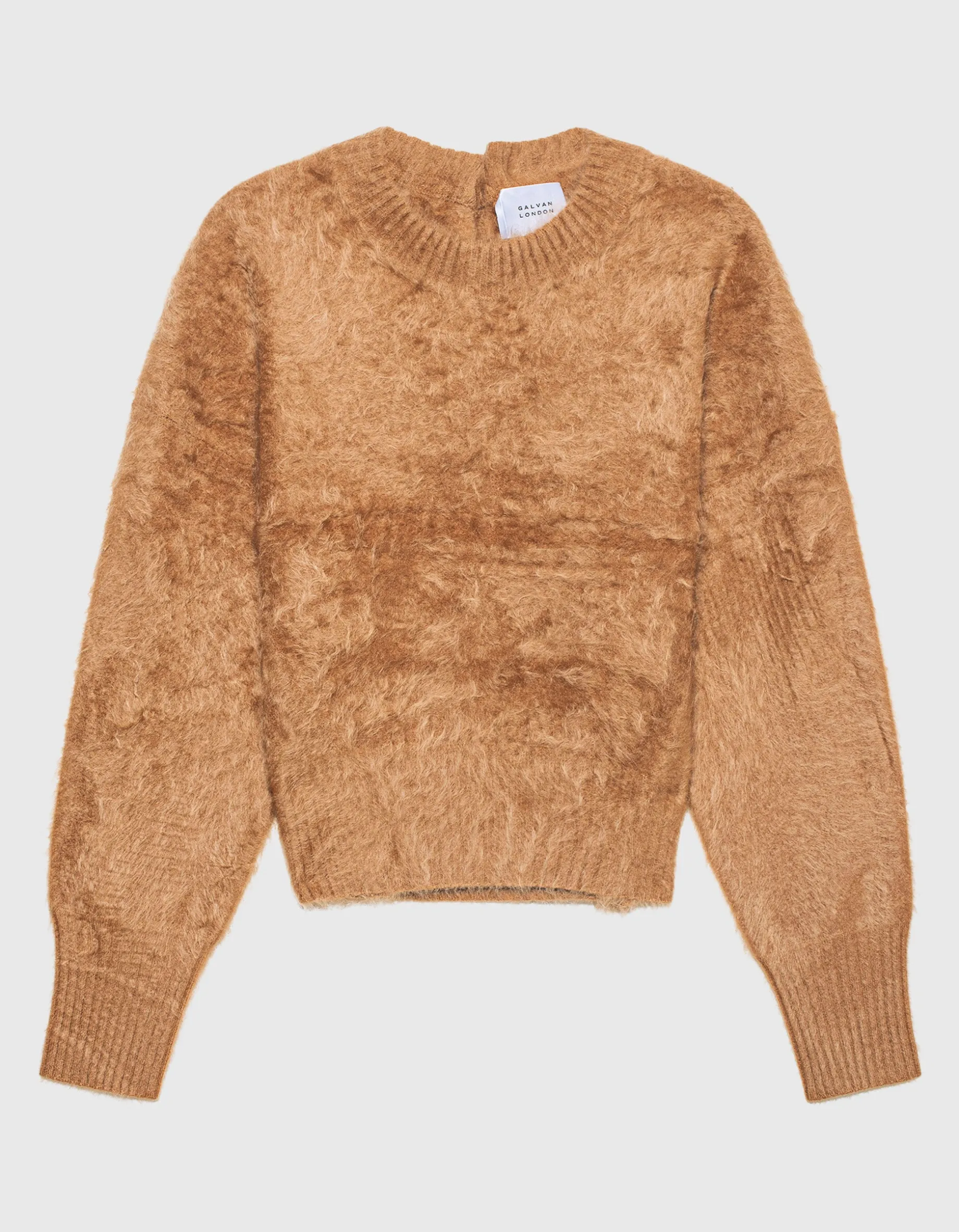 Fuzzy-Kaschmir-Pullover und dekorativen Knöpfen