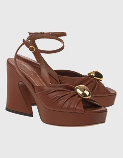 Leder-Heels Gleam mit dekorativer Metall-Verzierung