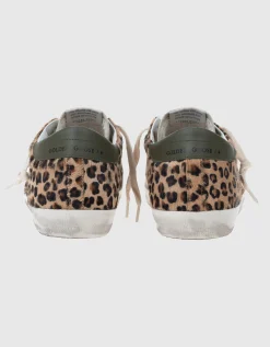 Leder-Sneaker mit Fell-Besatz